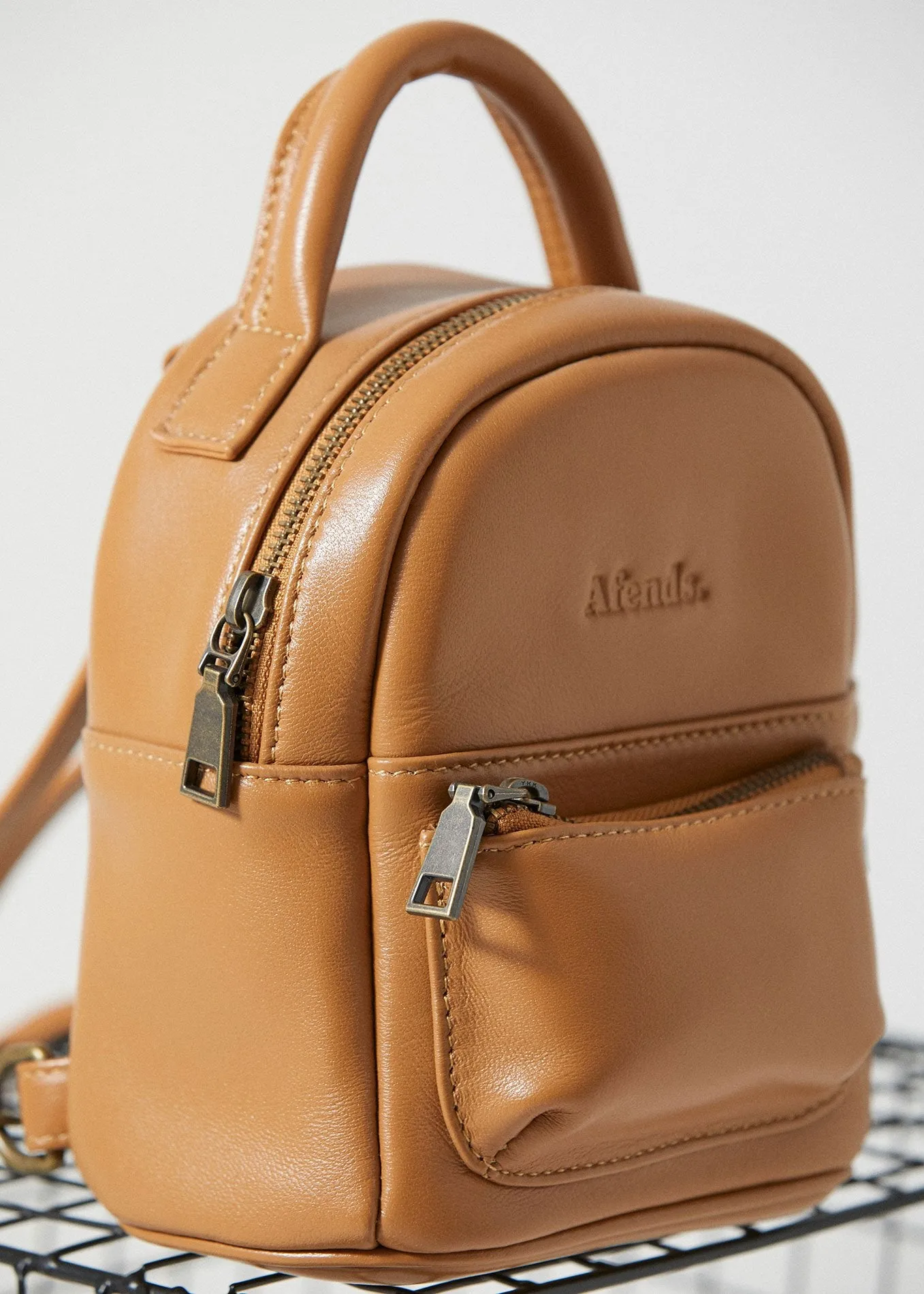 Afends Unisex Thea - Leather Adjustable Mini Backpack - Tan