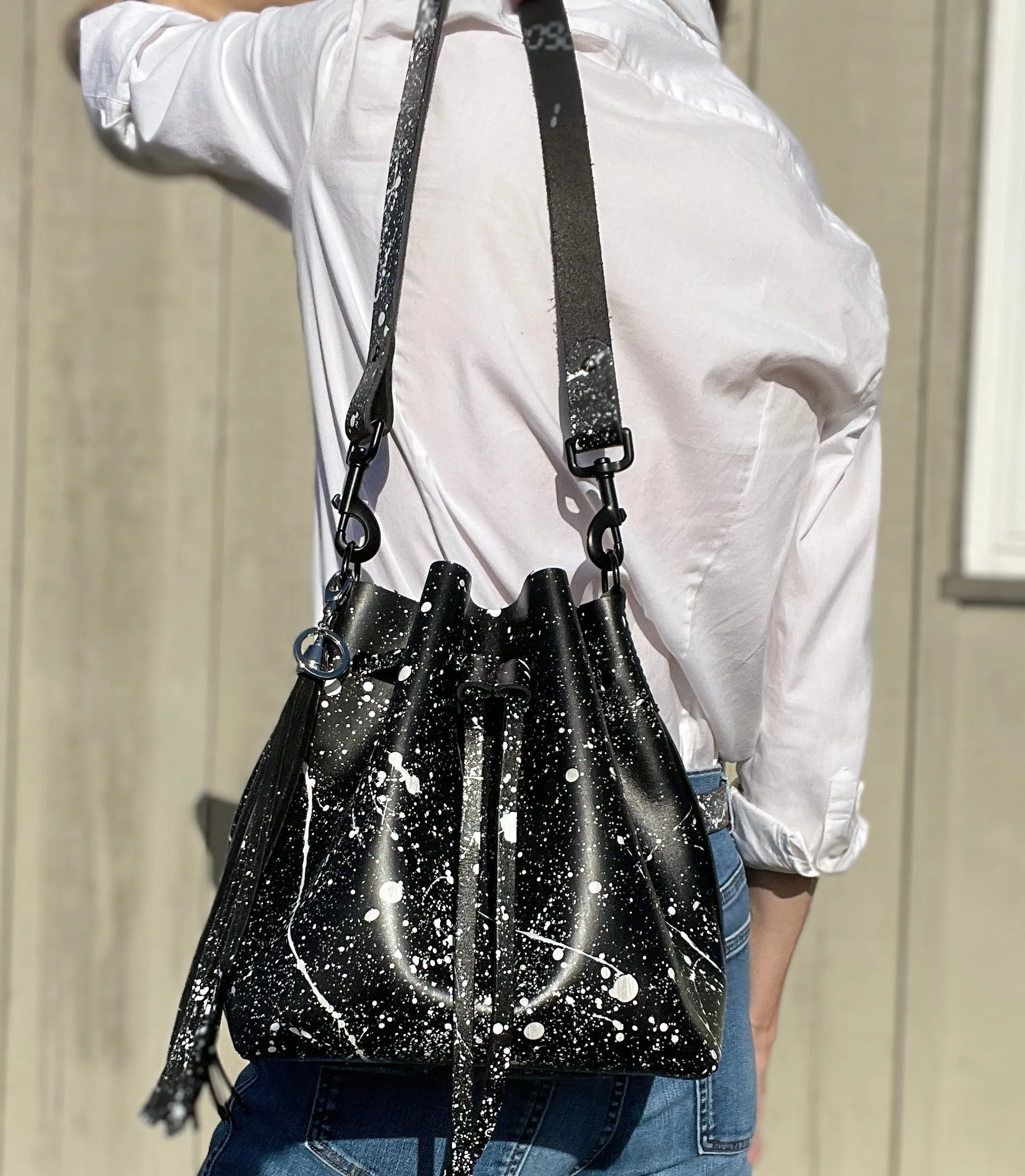 Black Leather Drawstring Bucket Shoulder Bag With Matte White Splatter