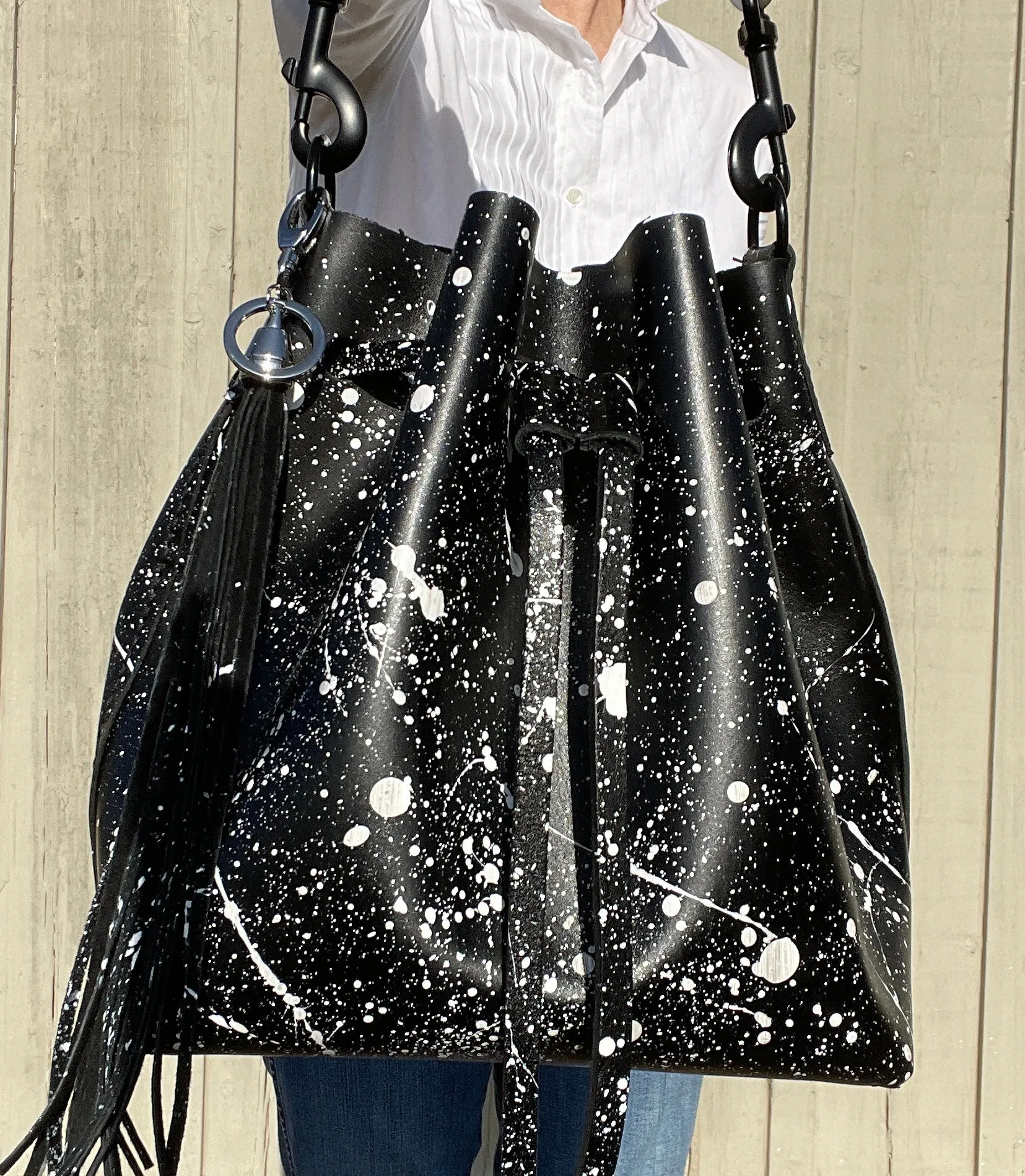 Black Leather Drawstring Bucket Shoulder Bag With Matte White Splatter