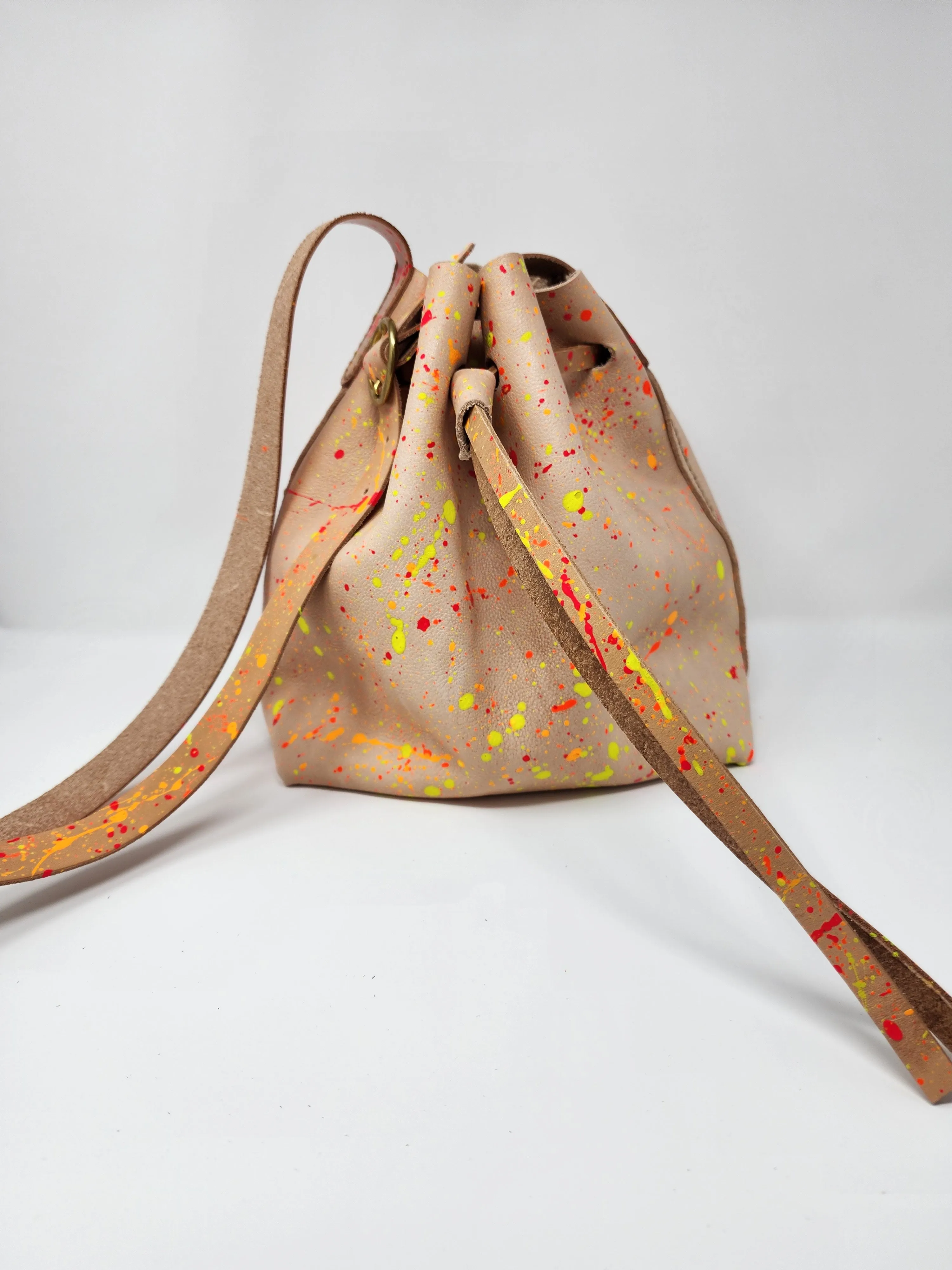 Neon Splatter Veg Tan Leather Drawstring Crossbody Bucket Bag