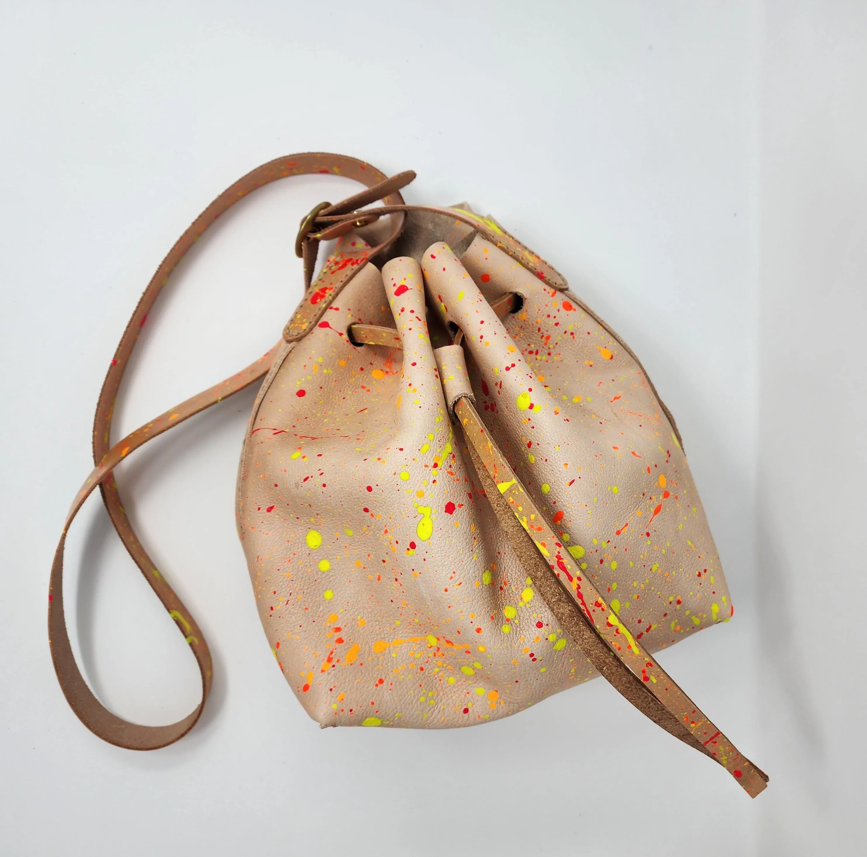 Neon Splatter Veg Tan Leather Drawstring Crossbody Bucket Bag