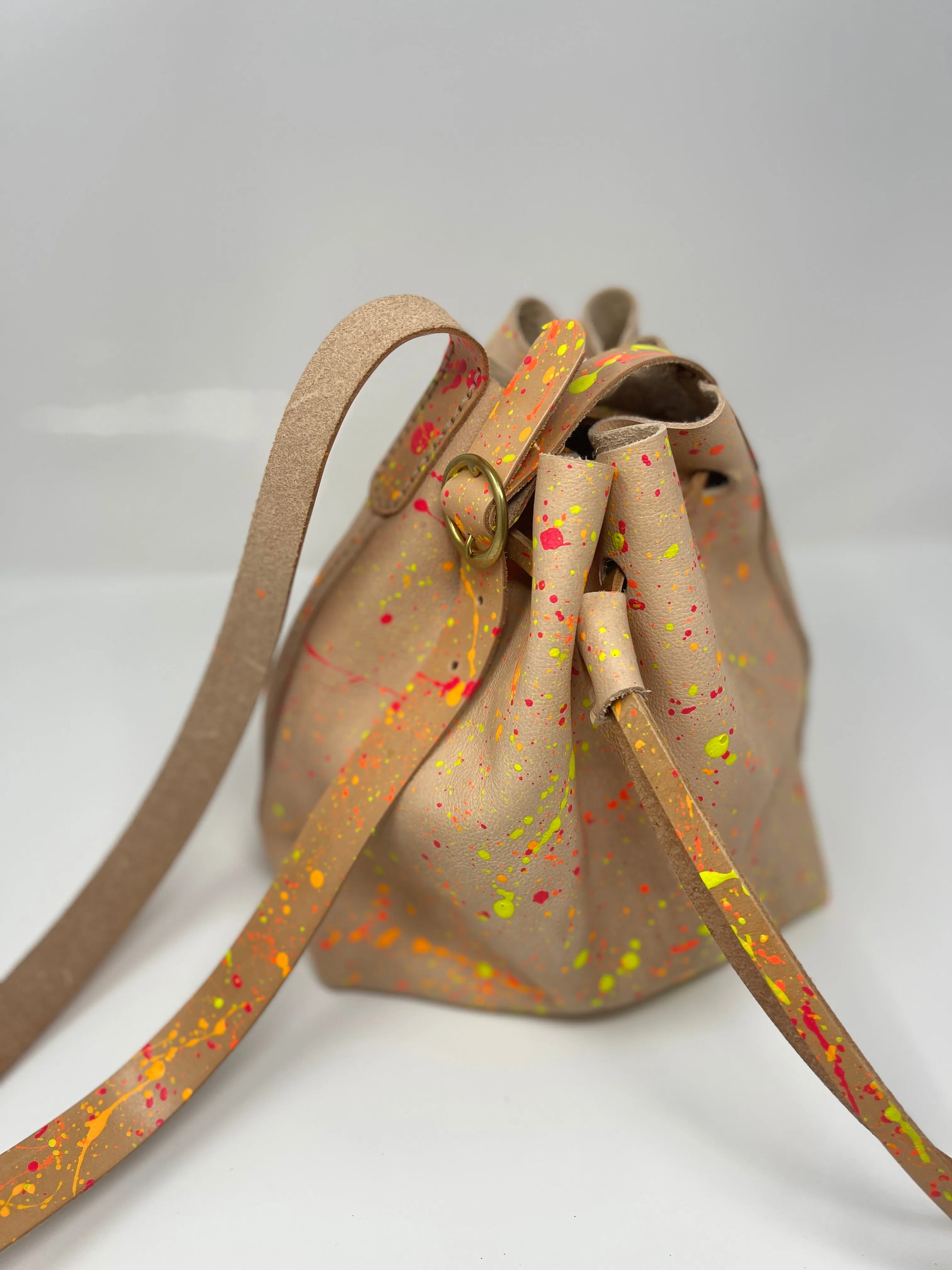 Neon Splatter Veg Tan Leather Drawstring Crossbody Bucket Bag