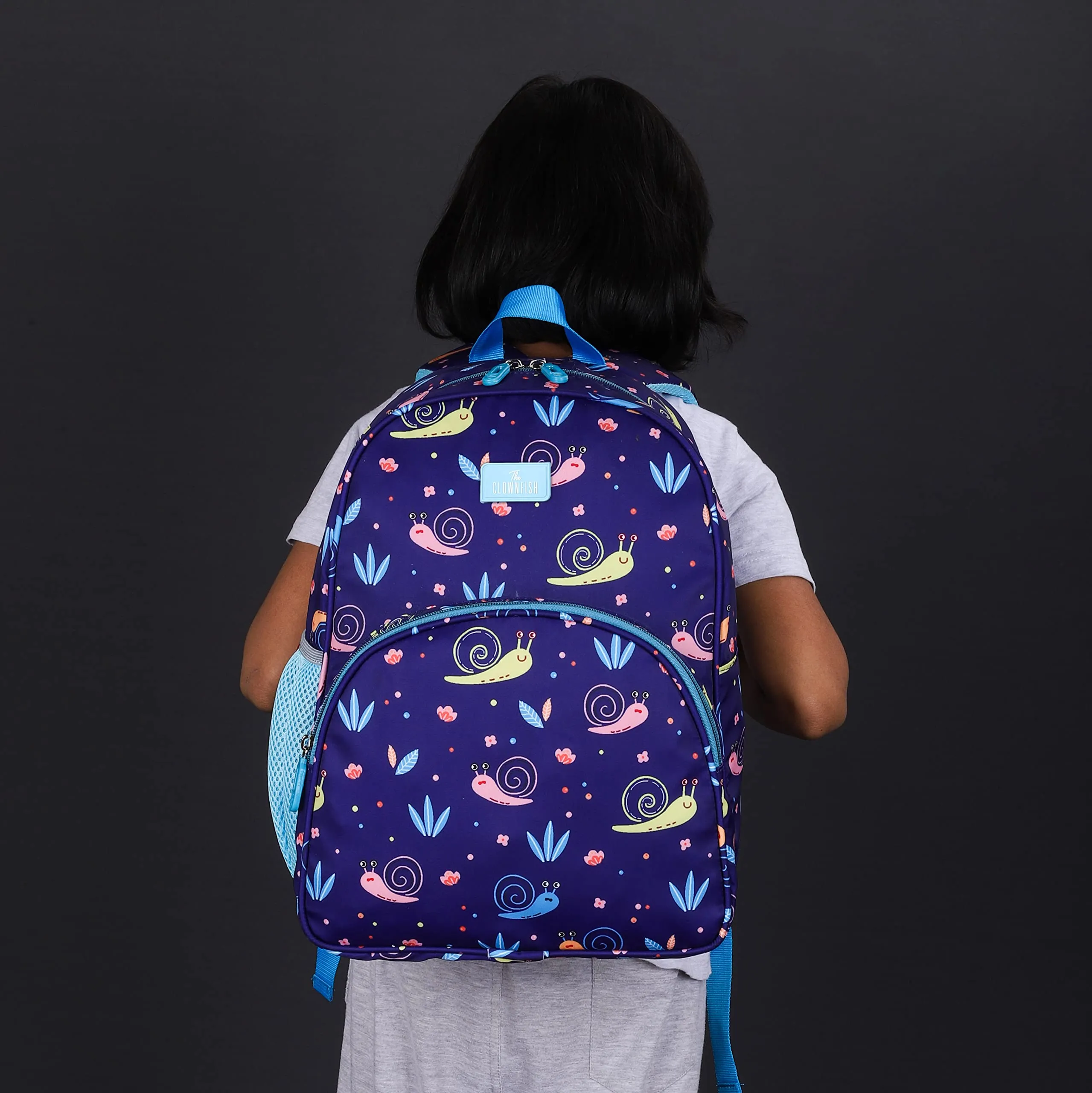 THE CLOWNFISH Cosmic Critters Series Printed Polyester 15 Litres Kids Standard Backpack School Bag Daypack Picnic Bag For Tiny Tots Of Age 5-7 Years (Navy Blue-Snail Print),Medium