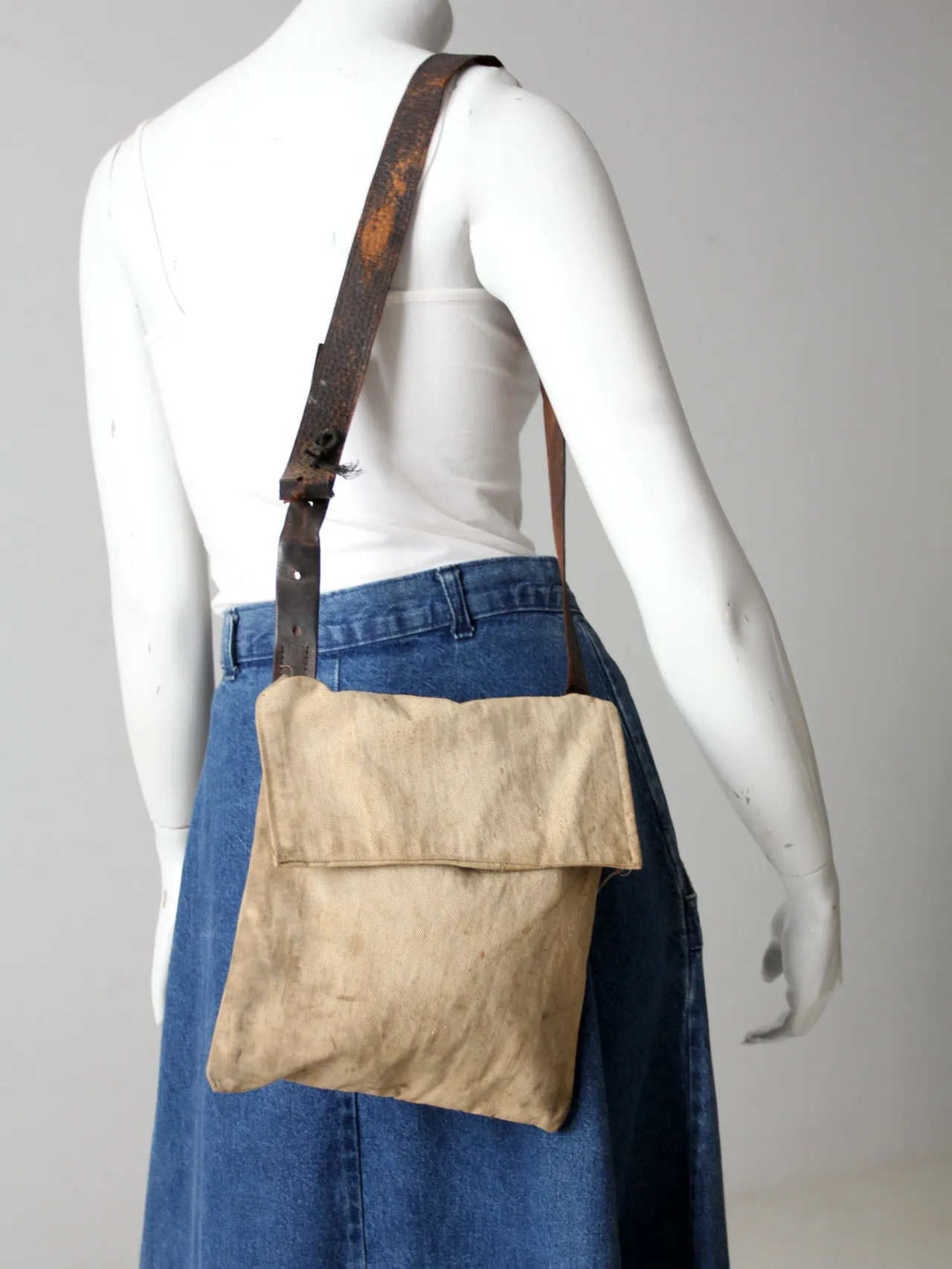 vintage textile and leather messenger bag