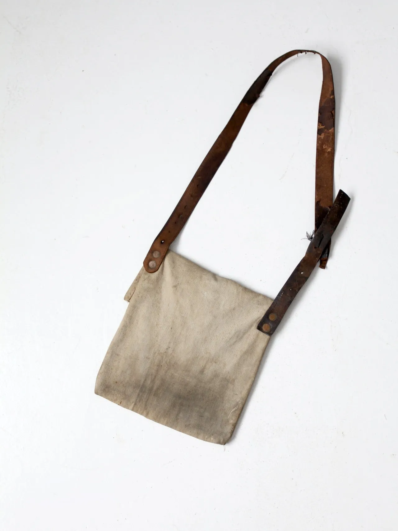 vintage textile and leather messenger bag