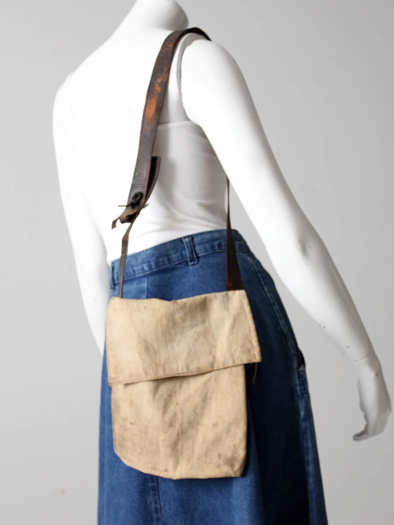 vintage textile and leather messenger bag